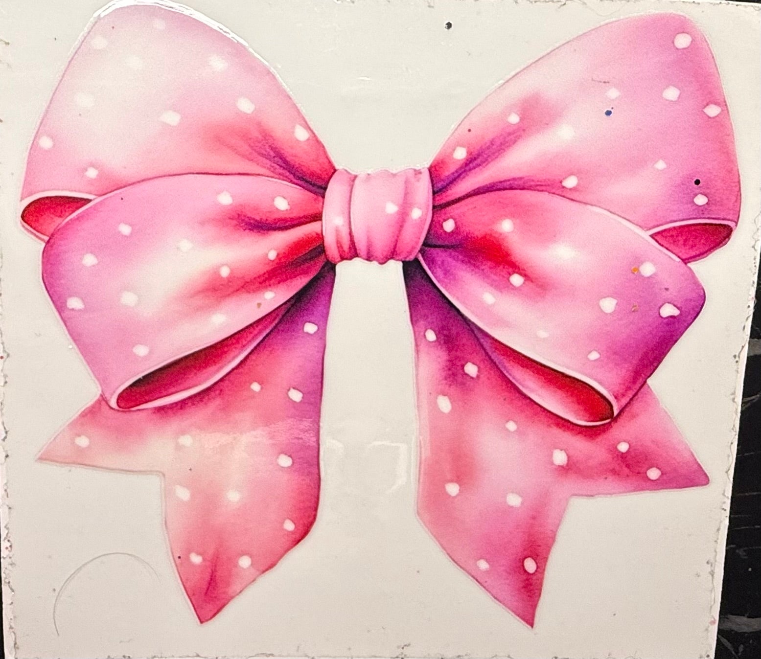 Pink speckled bow